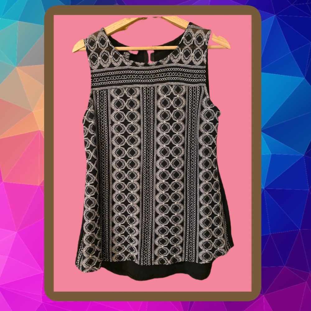 Black sleeveless blouse with crochet pattern